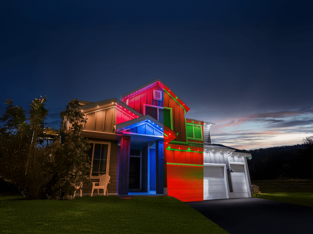 house illuminated at night with custom lighting
