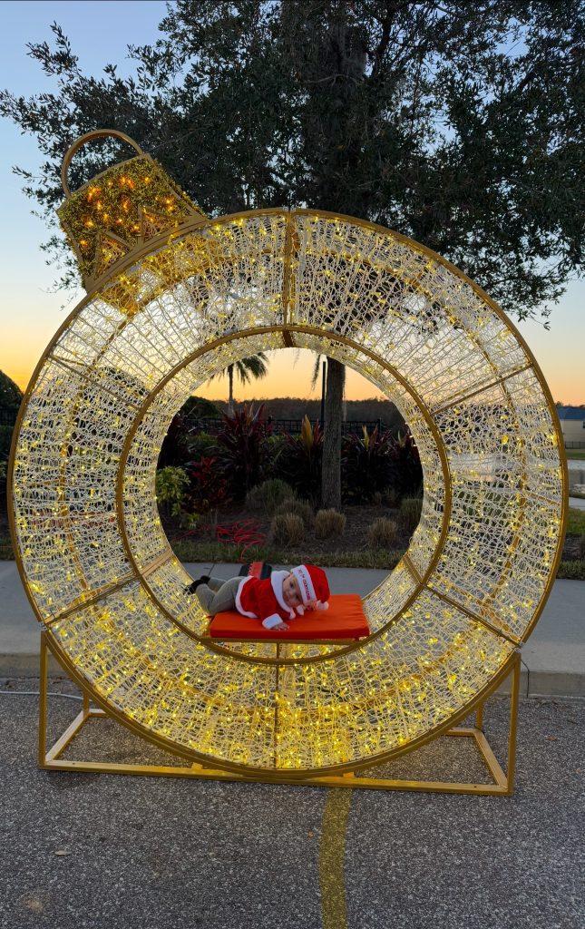 Baby in a lit ornament